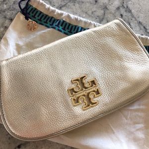 Tory Burch gold clutch with strap